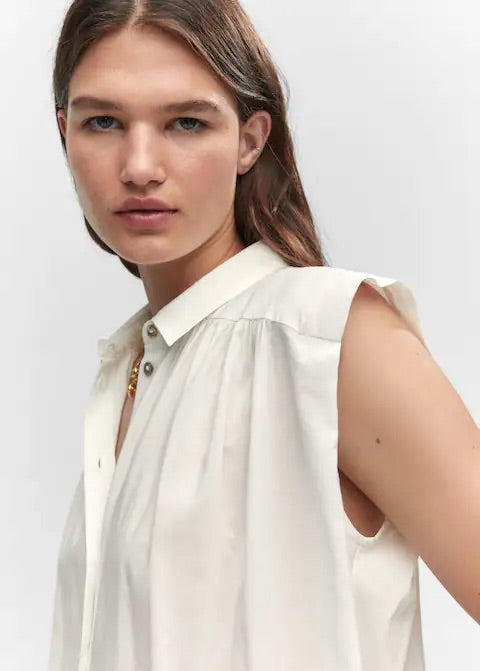 Sleeveless button down shirt