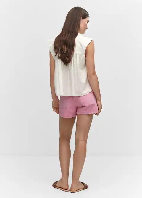 Sleeveless button down shirt