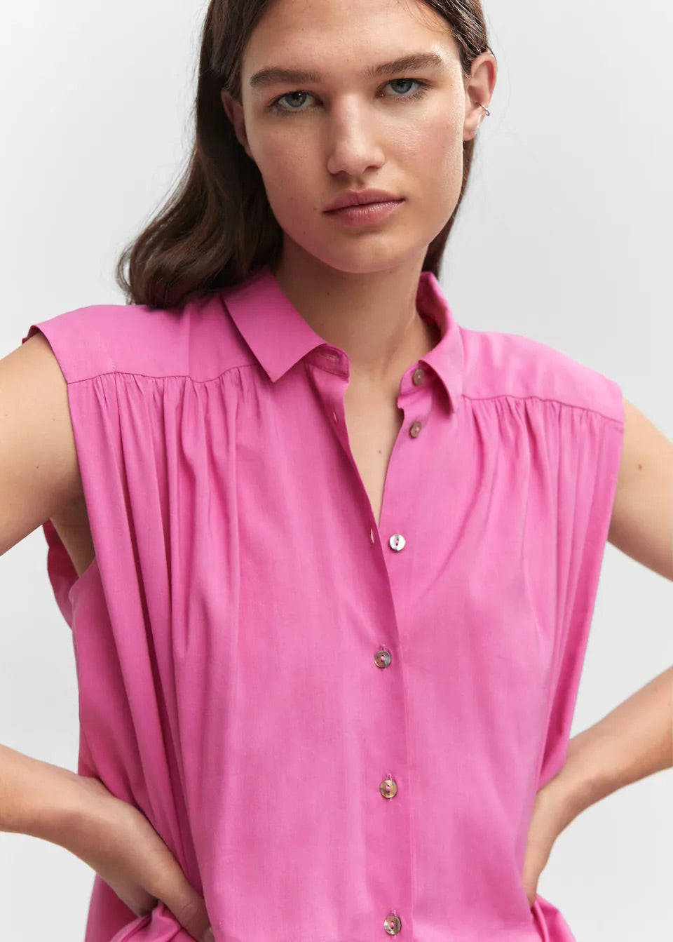 Sleeveless button down shirt