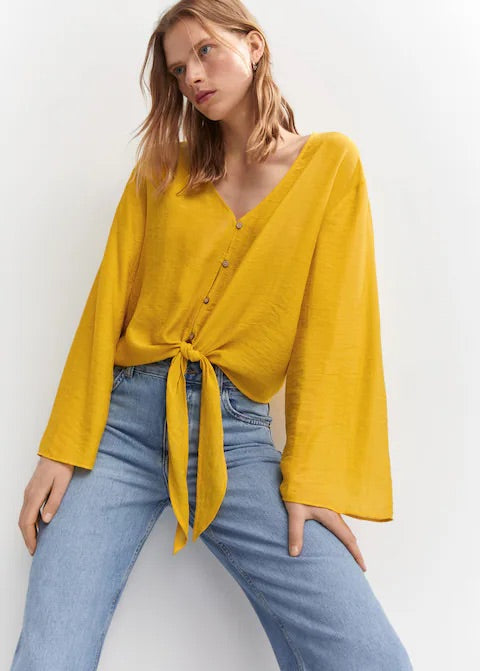 Flared-sleeve blouse with bow