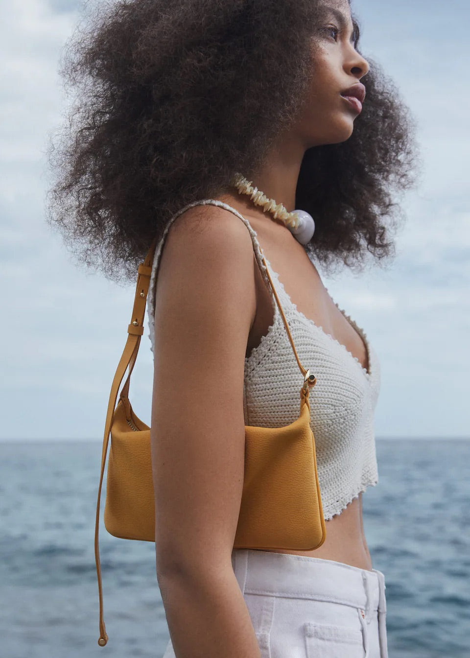 Leather bag with metallic detail