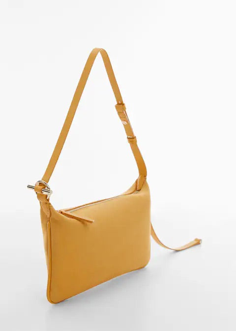 Leather bag with metallic detail