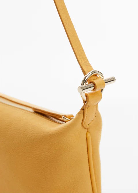 Leather bag with metallic detail
