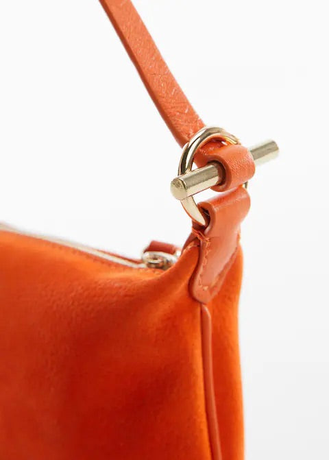 Leather bag with metallic detail