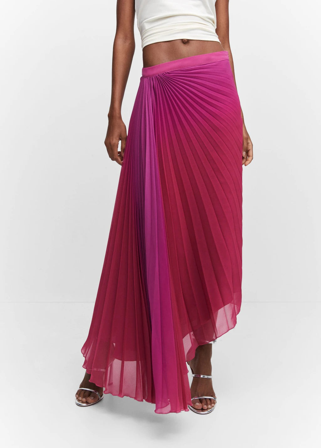 Pleated asymmetric skirt