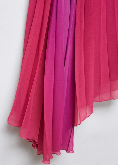 Pleated asymmetric skirt