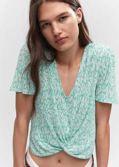 Textured blouse with knot detail