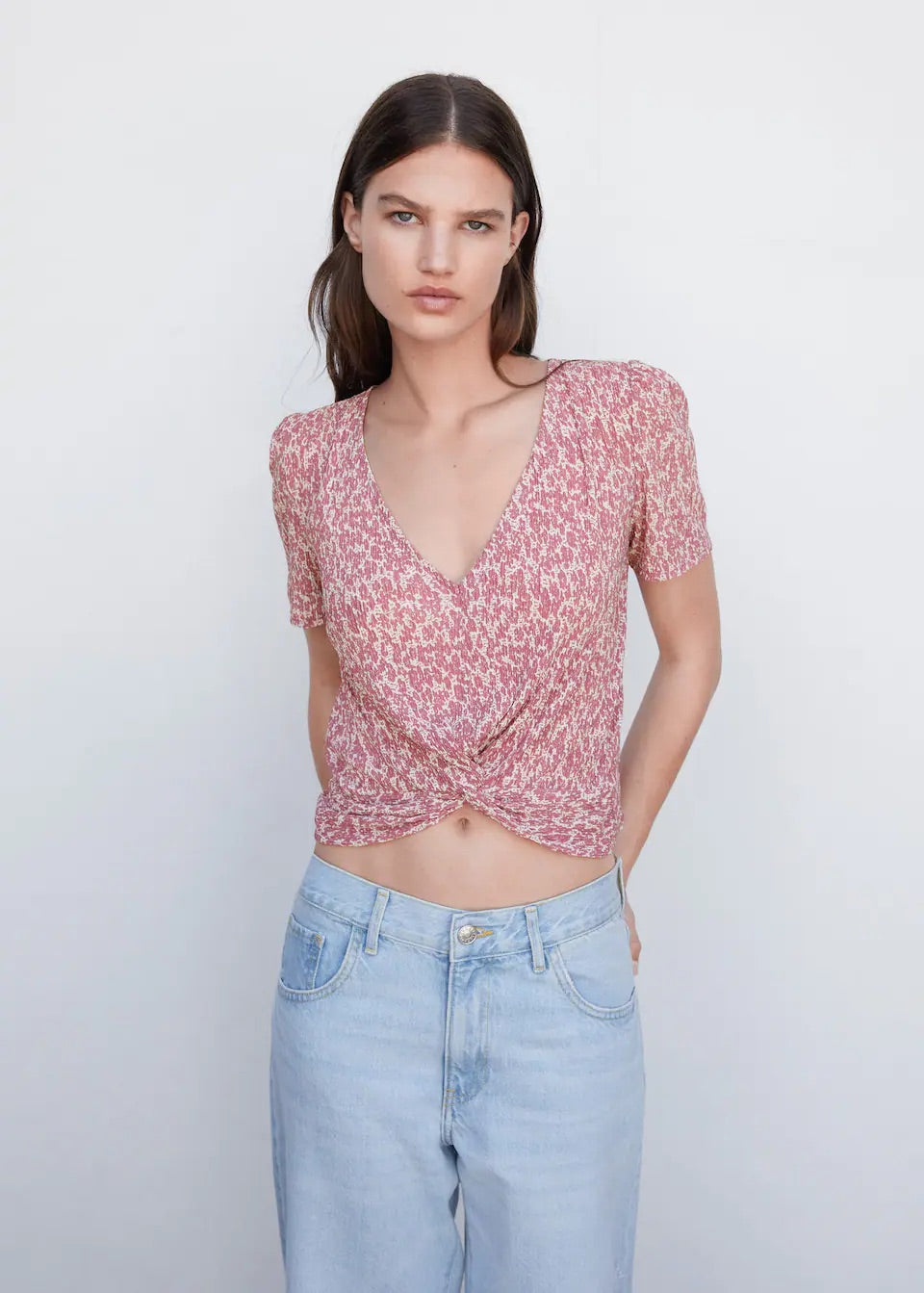 Textured blouse with knot detail