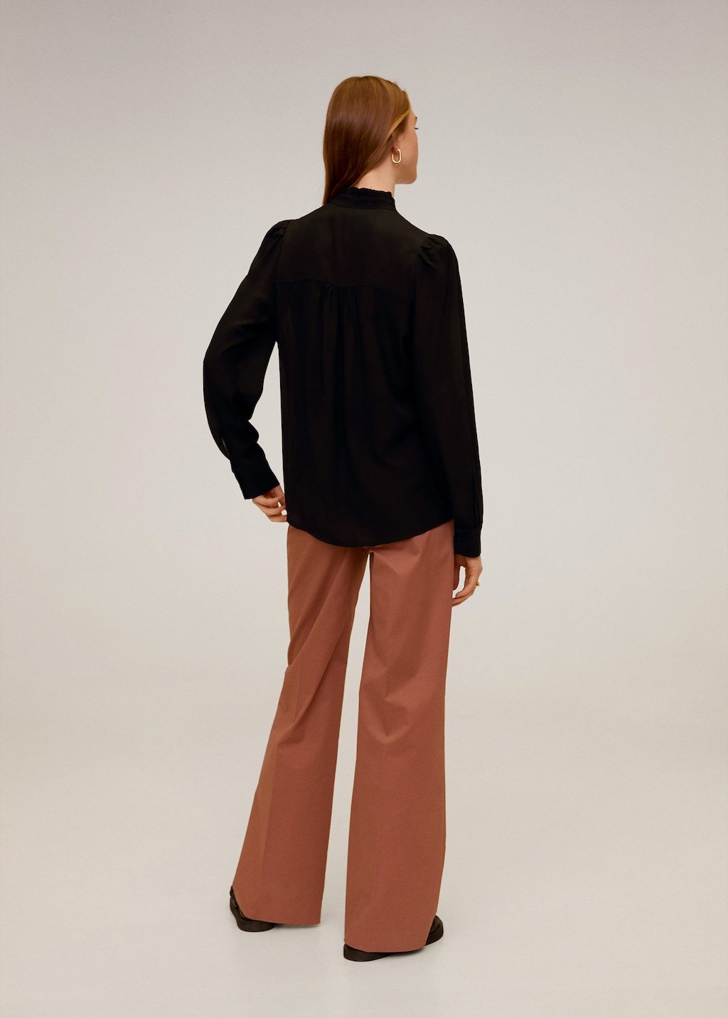Ruffled neck blouse