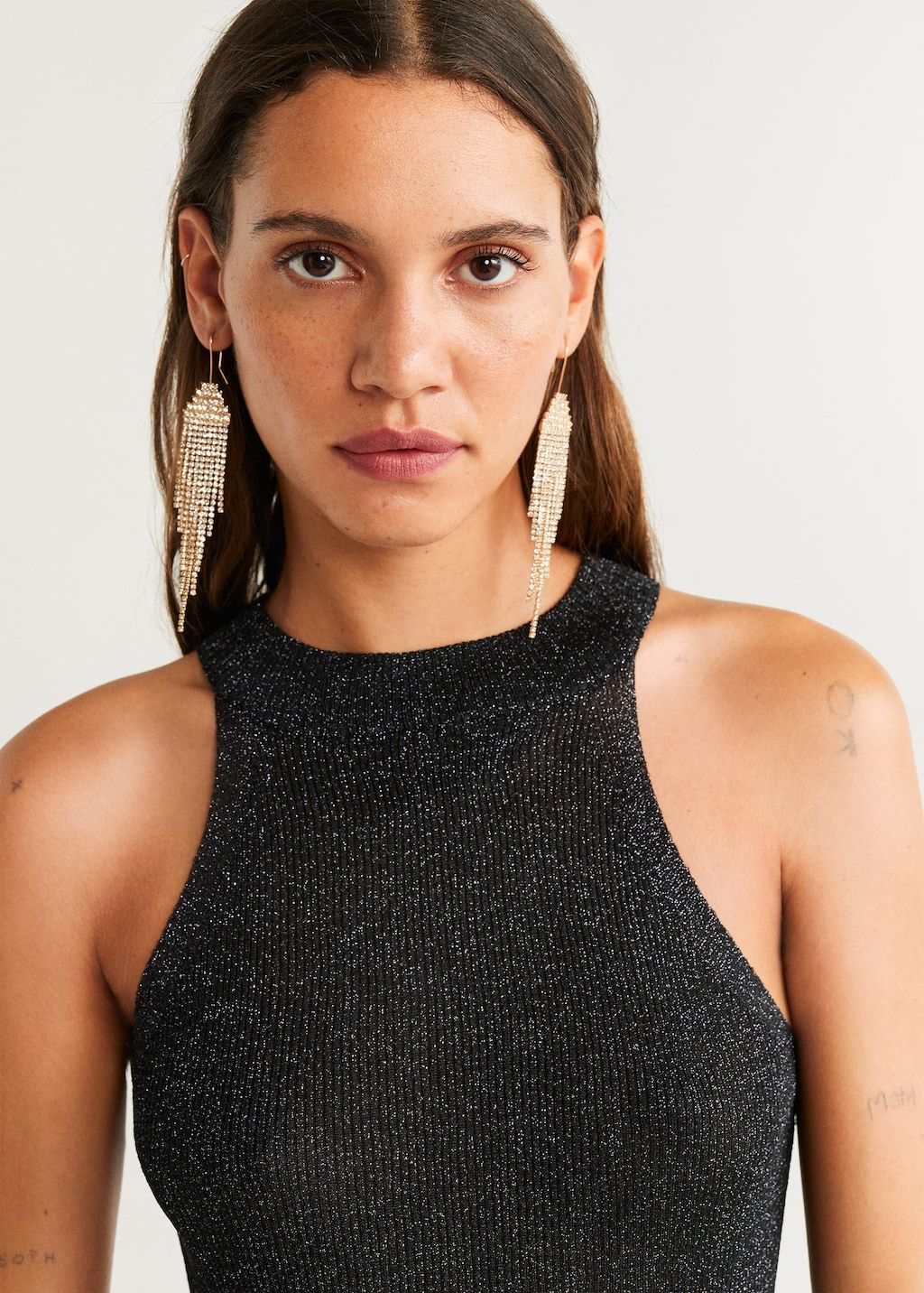 Metallic ribbed top